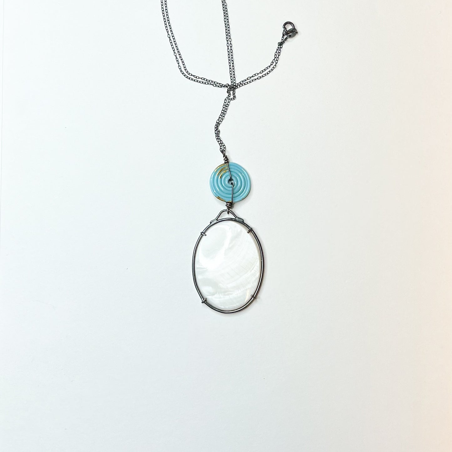 Mother pearl and handmade glass bead silver pendant